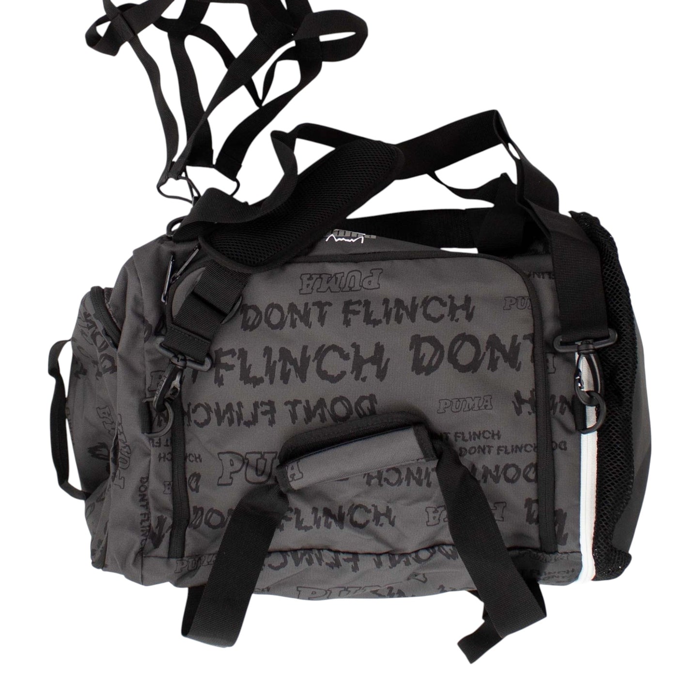 Brand Dealers Arena e.K. - BDA24 grey Puma duffle bag with 'Don't Flinch' graphic print, convertible to backpack with padded straps.